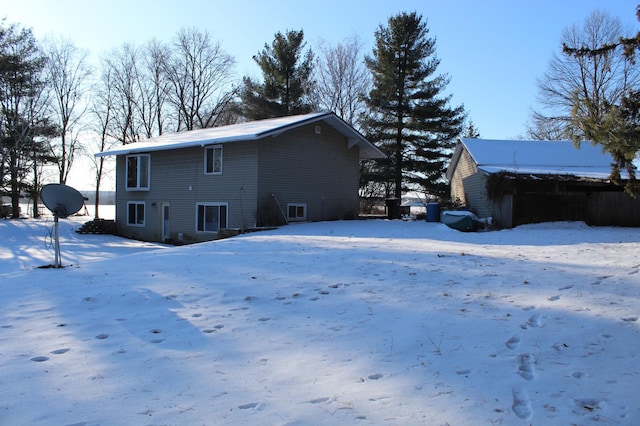 view of snow covered property