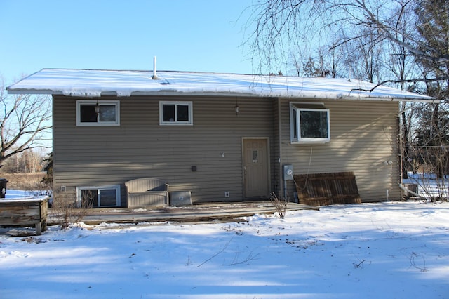 view of snow covered house