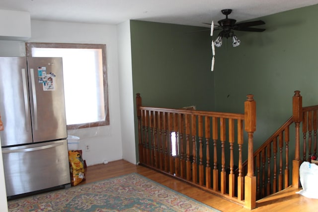 interior space featuring ceiling fan and hardwood / wood-style floors