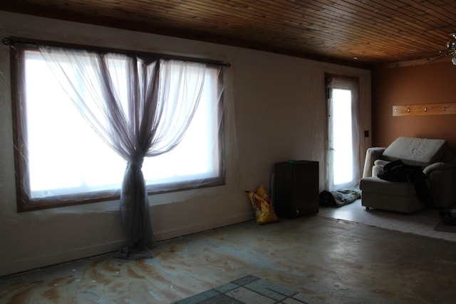 unfurnished living room with wooden ceiling