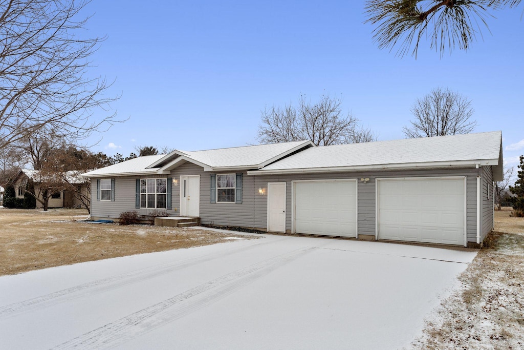 ranch-style house with a garage