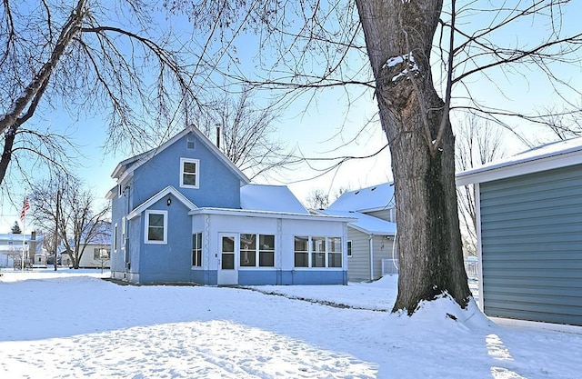 view of snow covered house