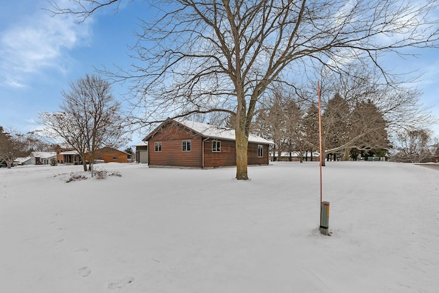 view of yard layered in snow