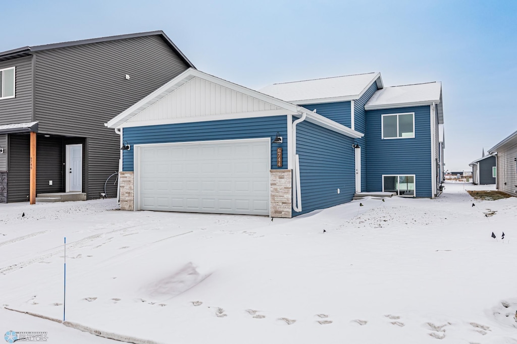 view of front of property with a garage