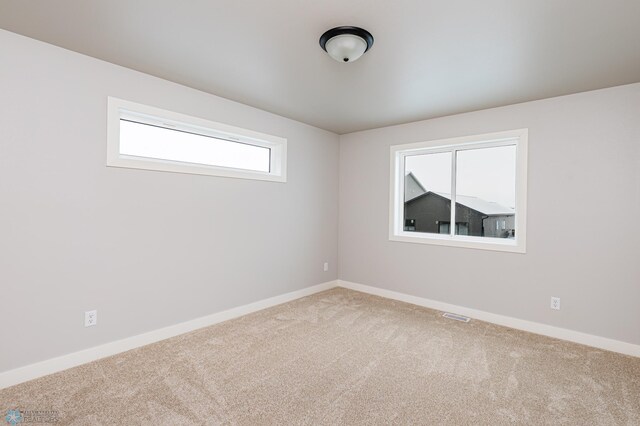 empty room featuring carpet