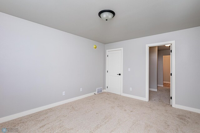 unfurnished bedroom with carpet