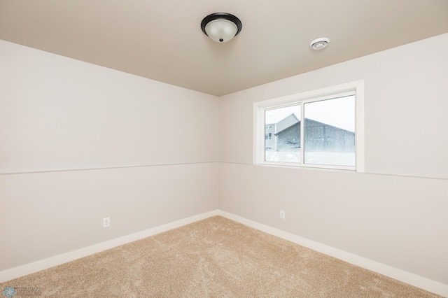 spare room with carpet flooring