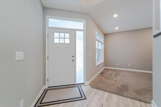 entryway with light hardwood / wood-style flooring