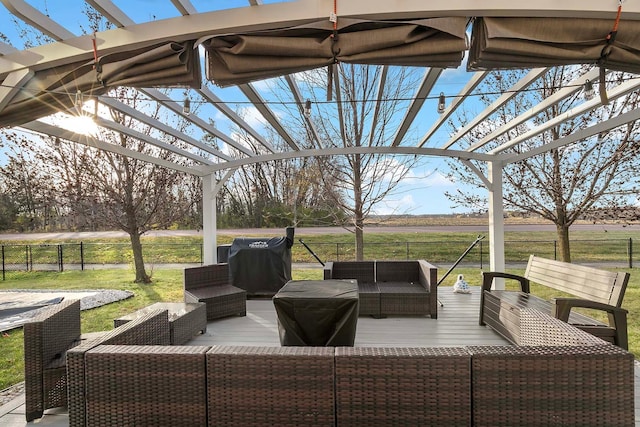 view of patio featuring a rural view, an outdoor hangout area, and a pergola