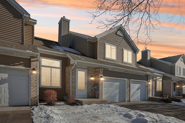 view of front of house with a garage