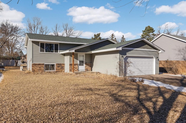 view of front of home with a garage