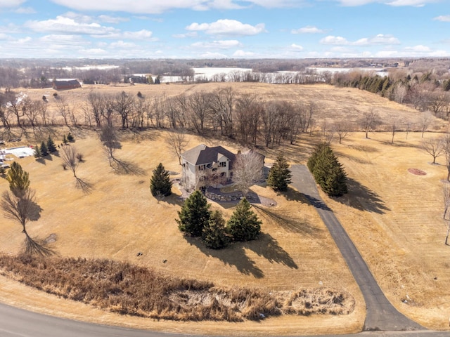 birds eye view of property featuring a rural view