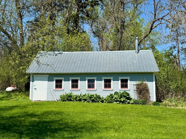 12326 Falk Trl, Northfield, MN 55057 - view of side of property with a lawn and metal roof