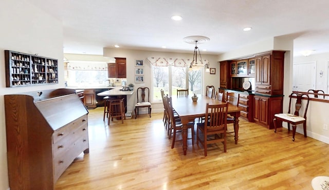12326 Falk Trl, Northfield, MN 55057 - dining area with light wood-style flooring, recessed lighting, and baseboards
