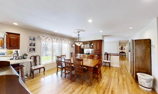 12326 Falk Trl, Northfield, MN 55057 - dining room with light wood finished floors, baseboards, and recessed lighting