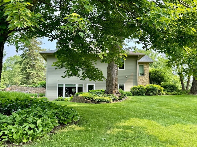 12326 Falk Trl, Northfield, MN 55057 - rear view of property featuring a lawn