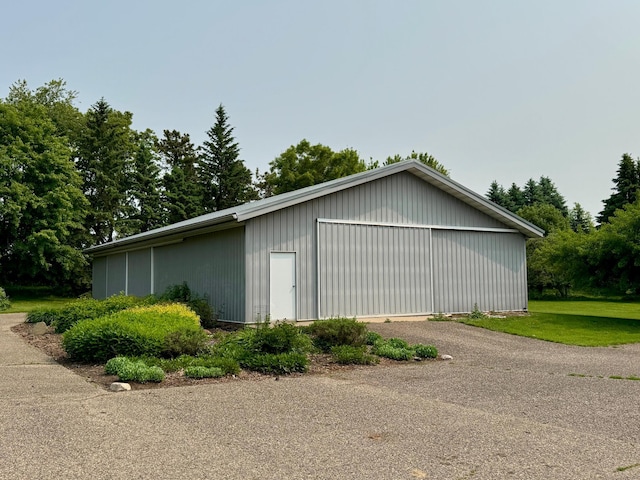 12326 Falk Trl, Northfield, MN 55057 - view of home's exterior with an outdoor structure and a garage