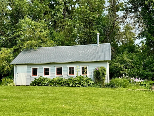 12326 Falk Trl, Northfield, MN 55057 - view of side of home featuring a yard and a metal roof