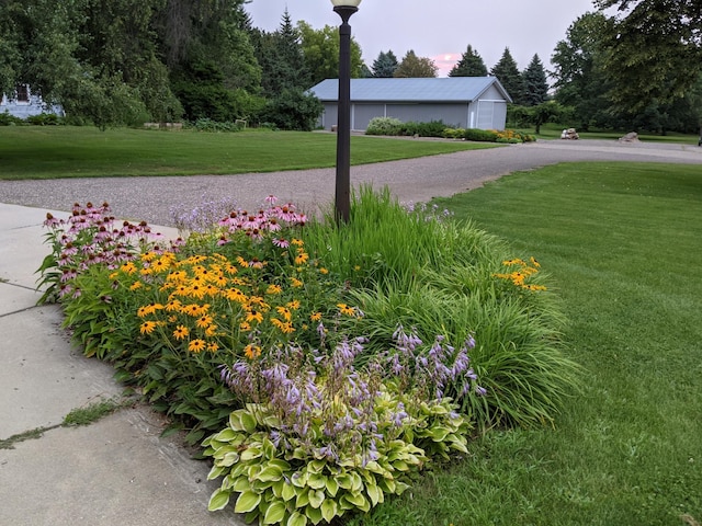 12326 Falk Trl, Northfield, MN 55057 - view of grassy yard with a garage
