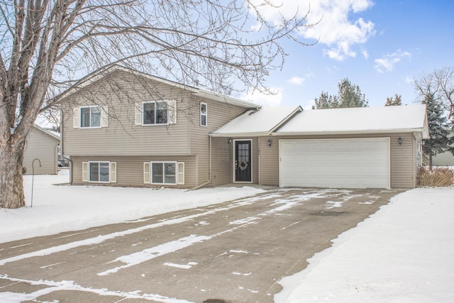 split level home with a garage