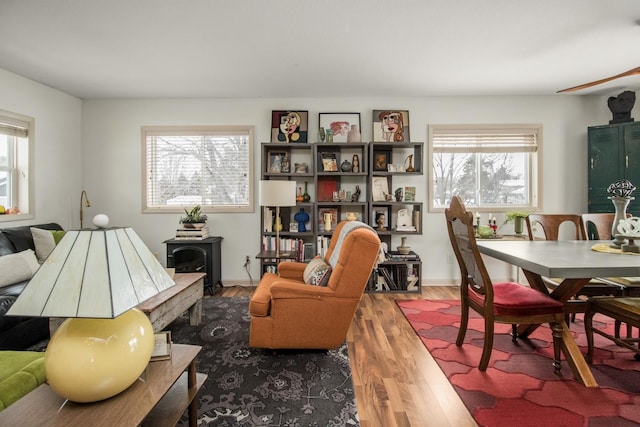 living area with hardwood / wood-style floors and plenty of natural light