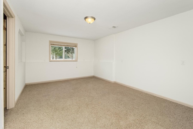 spare room with carpet