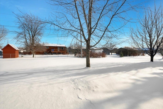 view of yard covered in snow