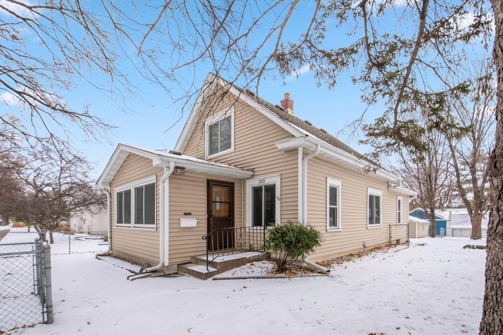 view of snow covered property