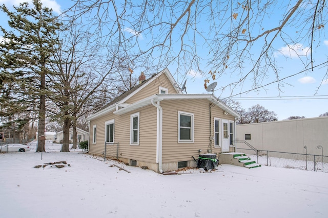 view of snow covered property