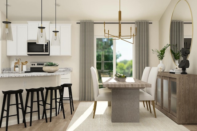 dining room featuring a notable chandelier, light wood-type flooring, and baseboards