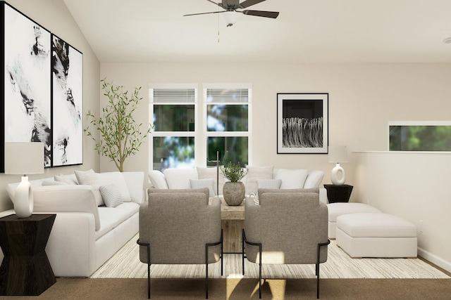 living area featuring ceiling fan