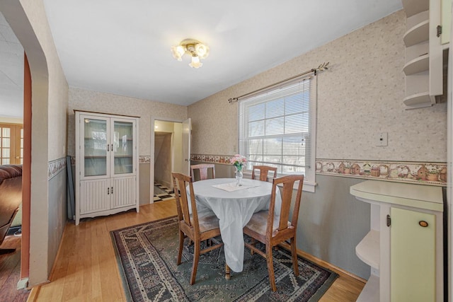 dining space featuring light hardwood / wood-style flooring