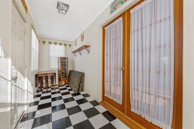 interior space featuring ornamental molding