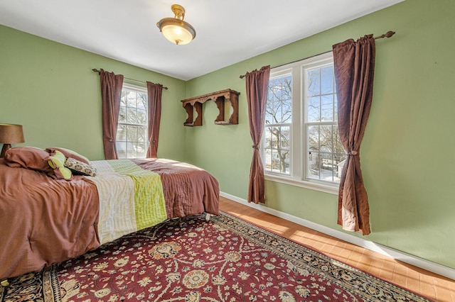 bedroom featuring hardwood / wood-style floors