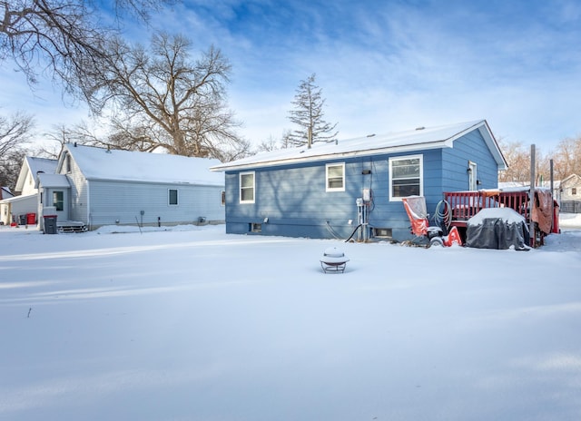 view of snow covered house