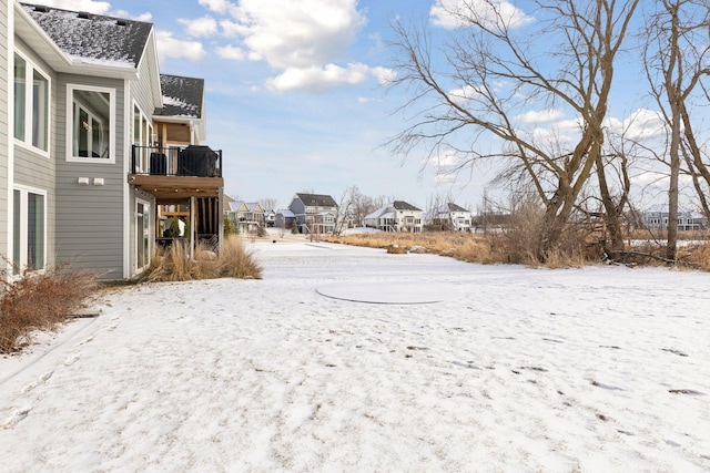 view of yard covered in snow