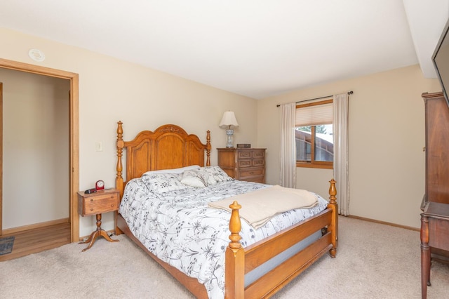 5440 Three Points Blvd Unit 525, Mound, MN 55364 - bedroom featuring light colored carpet