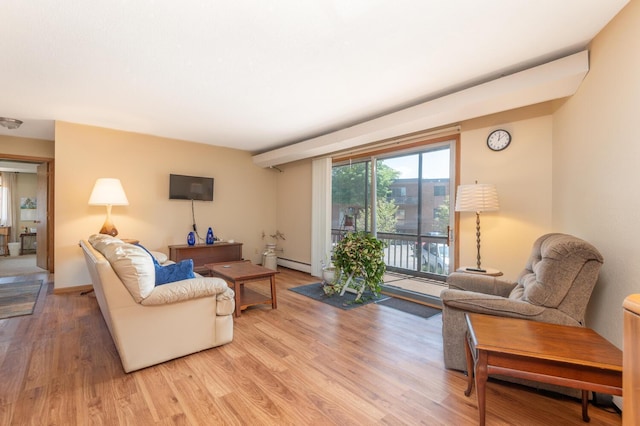 5440 Three Points Blvd Unit 525, Mound, MN 55364 - living area with light wood-type flooring and a baseboard heating unit