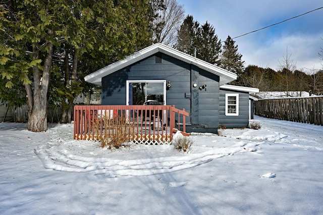 view of front of house featuring a wooden deck