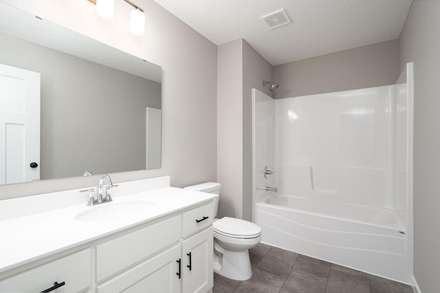 full bathroom with toilet, a textured ceiling, shower / tub combination, and vanity