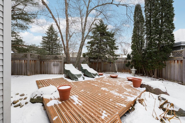 view of snow covered deck