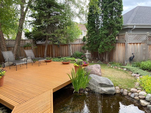 view of yard with a deck