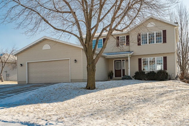 front of property with a garage