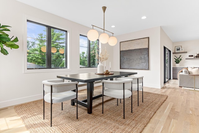 dining area featuring light hardwood / wood-style floors