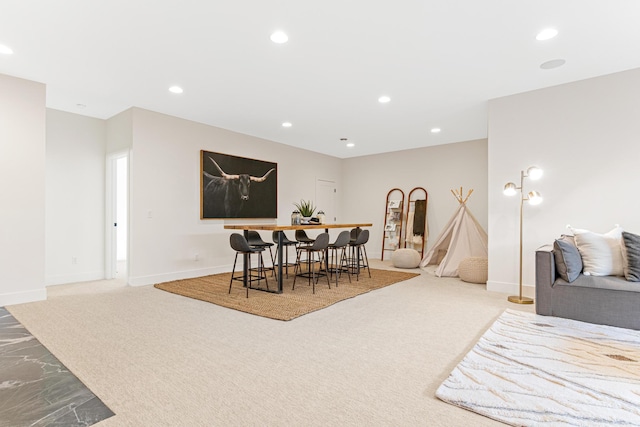 view of carpeted dining area