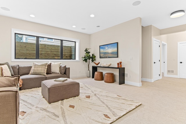 living room featuring light colored carpet