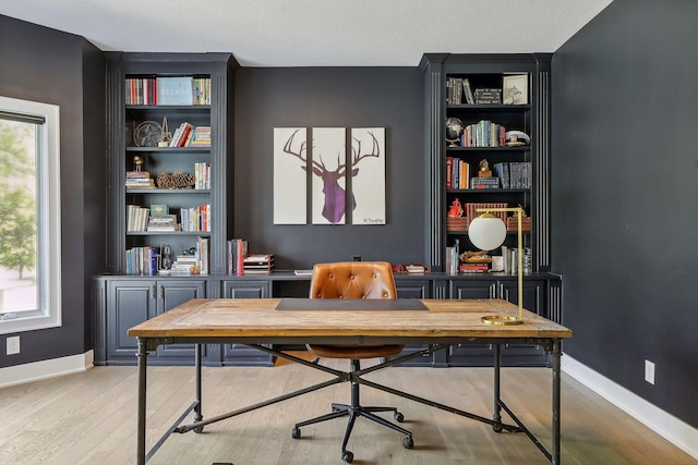 office area with light wood-type flooring