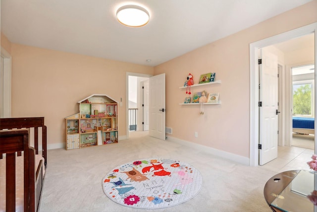 bedroom with light carpet