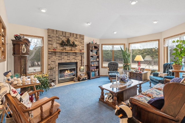 living room featuring a brick fireplace and carpet flooring