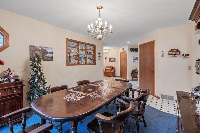 dining room with an inviting chandelier